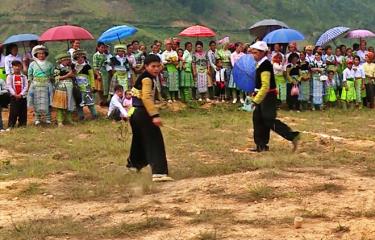 Mong ethnic people in Tram Tau district take part in the spinning top competition at the festival.