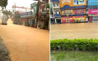 Những trận mưa lớn dồn dập đổ xuống khiến một số con đường ở thành phố Yên Bái ngập sâu hàng giờ liền trong sáng 7/8 gây khó khăn cho các phương tiện giao thông và đảo lộn cuộc sống của người dân.